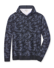 Hickam Reversible Sweater Hoodie in camouflage New Indigo layered over a white polo, front view