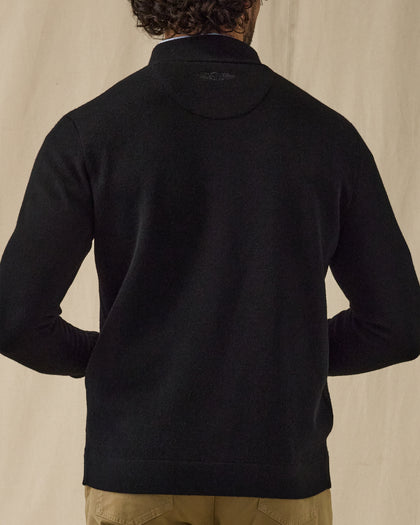 Men's Sarazen Knit Bomber in Black, on model back view featuring a black fine knit bomber with Straight Down logo at the upper back and ribbed hem