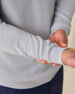 Men's St. Andrews Quarter Zip in Heather, close-up detail view of the ribbed cuff and textured knit fabric