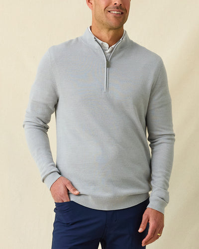 Men's St. Andrews Quarter Zip in Heather, front view on model featuring a light heather gray textured knit with quarter zip closure, paired with navy pants