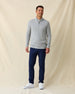 Men's St. Andrews Quarter Zip in Heather, full length front view on model featuring a light heather gray textured knit with quarter zip closure, paired with navy pants and white shoes