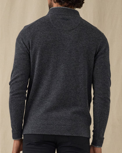 Men's Lakeside Quarter Zip Sweater in Charcoal Heather, on model back view featuring a charcoal heather fine knit quarter zip sweater with Straight Down logo at the upper back and ribbed hem