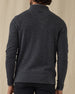 Men's Lakeside Quarter Zip Sweater in Charcoal Heather, on model back view featuring a charcoal heather fine knit quarter zip sweater with Straight Down logo at the upper back and ribbed hem