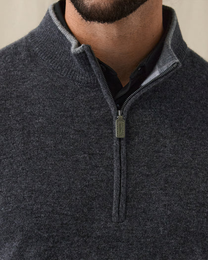 Men's Lakeside Quarter Zip Sweater in Charcoal Heather, on model front close-up view featuring fine knit texture detail, light grey contrast stand collar, and olive green Straight Down branded leather zipper pull
