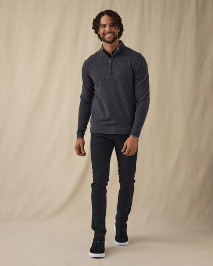 Men's Lakeside Quarter Zip Sweater in Charcoal Heather, on model front full-length view featuring a charcoal heather fine knit quarter zip sweater with light grey contrast stand collar paired with black pants and shoes