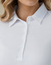 Midday Long Sleeve Polo in White, close-up front view on model highlighting the pointed collar and half-button neckline detail