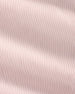 A close-up of a light blush pink fabric with a fine vertical ribbed texture and soft, diagonal folds.