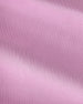 A close-up of light pink fabric with a fine woven texture and soft diagonal folds.