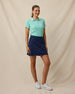 Sindy Rib Knit Polo in Cascade tucked into navy skort, full outfit model view