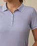 Close-up collar detail of the Sindy Rib Knit Polo in Cosmic Purple highlighting the rib knit fabric, button placket, and white contrast trim