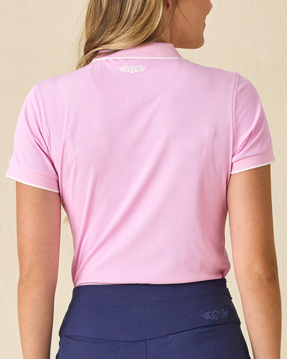 Women's Sindy Rib Knit Polo in Pink Floyd, back view on model featuring a ribbed knit with Straight Down logo embroidered at center back neck, paired with navy pants