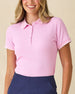 Women's Sindy Rib Knit Polo in Pink Floyd, front view on model featuring a ribbed knit with white tipped collar and cuffs, paired with navy pants