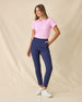Women's Sindy Rib Knit Polo in Pink Floyd, full length front view on model featuring a ribbed knit with white tipped collar and cuffs, paired with navy pants and white shoes