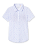 Straight Down Mariette Polo in Pink Floyd, flat lay front view featuring an allover blue and purple vine floral print