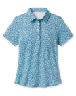 Huli Polo in Tidal Blue with tropical leaf print, front view