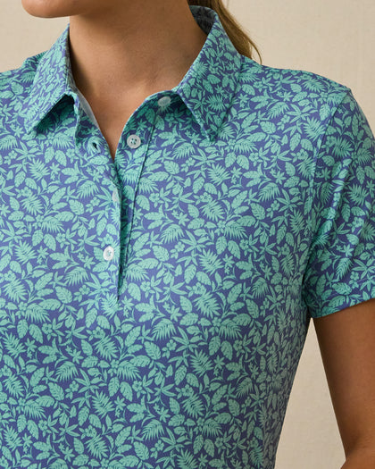 Huli Polo in Tidal Blue with tropical leaf print, detail view