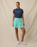 Sprinkles Polo in New Indigo with scattered floral print, tucked full outfit view