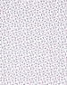 Close-up of the Martini Girl Polo in Lemongrass fabric featuring an allover pattern of miniature martini glasses with subtle pink and dark accents.