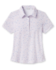 Front product view of the Wonderland Polo in White showcasing a floral print