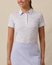 Model wearing the Wonderland Polo in White