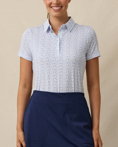 Dog Park Polo in Tidal blue with playful dog print, front model view