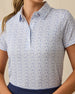 Dog Park Polo in Tidal blue with playful dog print, print detail view