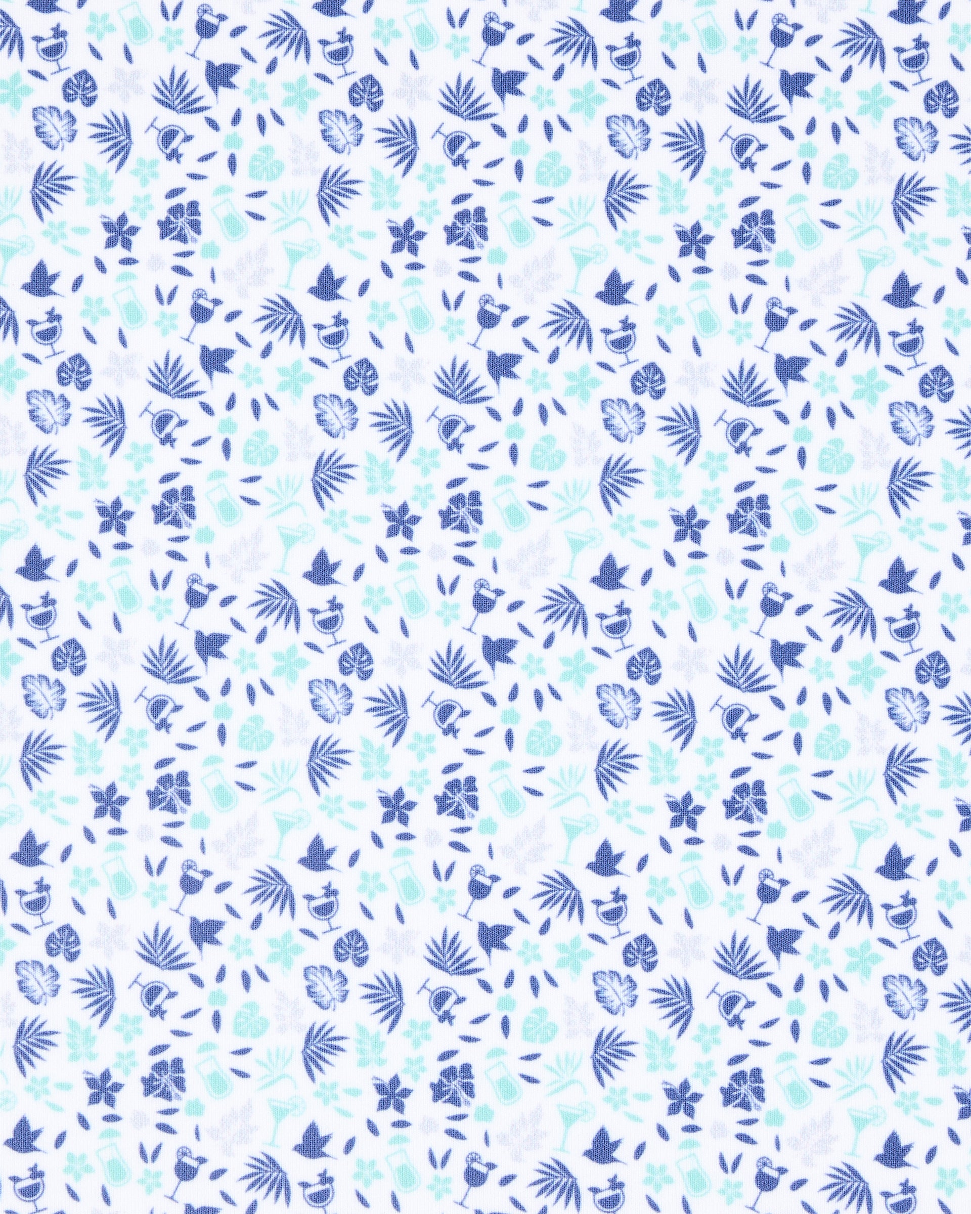 Close-up of the Palm Island Polo in Tidal fabric featuring a pastel print of palm leaves, flowers, tropical foliage, and cocktail motifs.