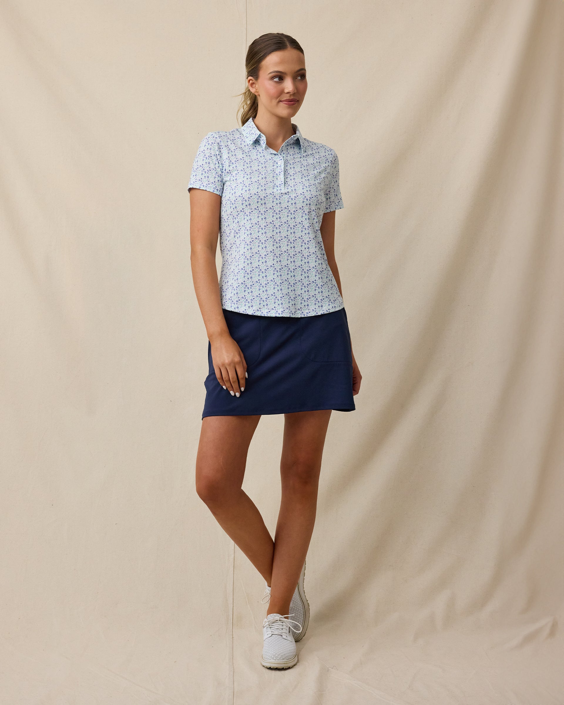 Palm Island Polo in Tidal clue with tropical floral print, full outfit view