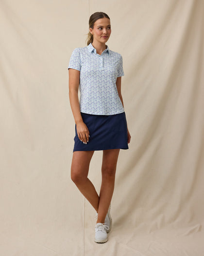 Palm Island Polo in Tidal clue with tropical floral print, full outfit view