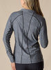 Straight Down Women's Claire Quarter Zip in Black, back view on model featuring a heathered charcoal long sleeve quarter zip pullover with contrast black seam detailing, paired with black pants