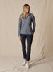 Straight Down Women's Claire Quarter Zip in Black, full length front view on model featuring a heathered charcoal long sleeve quarter zip pullover with contrast black seam detailing, paired with black pants and white shoes