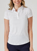 Women's Abbot Polo in White, front view on model featuring a white short-sleeve polo with spread collar, paired with navy pants