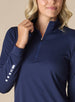 Women's Aero Quarter Zip in New Indigo, close-up front detail view featuring the micro-texture fabric, quarter-zip neckline, and white square accent detail on the sleeve