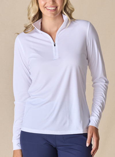 Women's Aero Quarter Zip in White, front view on model featuring a clean white performance fabric with a quarter-zip collar and long sleeves, paired with navy pants