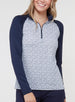 Straight Down Women's Daizee Quarter Zip in New Indigo, on model front view showing white floral print body with solid navy raglan sleeves and quarter zip closure paired with navy pants