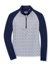 Straight Down Women's Daizee Quarter Zip in New Indigo, flat lay front view showing white floral print body with solid navy raglan sleeves, stand collar, and quarter zip closure