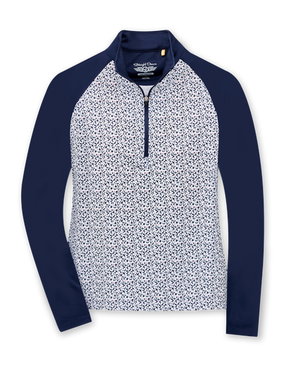 Straight Down Women's Daizee Quarter Zip in New Indigo, flat lay front view showing white floral print body with solid navy raglan sleeves, stand collar, and quarter zip closure