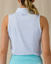 Women's Juno Stripe Sleeveless Polo in Glacier, back on-model view featuring a white sleeveless polo with a blue and mint multi-stripe pattern, spread collar, and Straight Down logo embroidered at the upper back, paired with a mint green skirt
