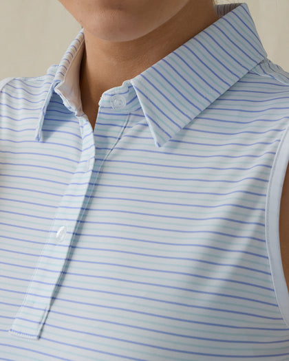 Women's Juno Stripe Sleeveless Polo in Glacier, close-up front on-model view highlighting the spread collar and two-button placket detail featuring a blue and mint multi-stripe pattern on a white base