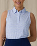 Women's Hydra Sleeveless Polo in Lavender, front on-model view from the waist up featuring a white sleeveless polo with an allover small floral print in light blue tones, spread collar, and two-button placket, paired with navy pants
