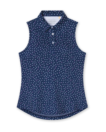 Cherry Bloom Sleeveless Polo in New Indigo, flat lay front view featuring a navy base with a scattered white and pink floral print