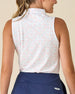 Valerie Sleeveless Polo in Spritz, back view featuring a white base with coral floral and light blue vine allover print pattern with Straight Down logo at the back collar, paired with navy shorts