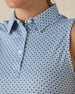 Milano Sleeveless Polo in Gemstone, close-up detail view featuring navy geometric medallion print on a white base with pearl buttons