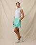 Paradise Lost Sleeveless Polo in Tidal with ocean-inspired print, side outfit tucked view