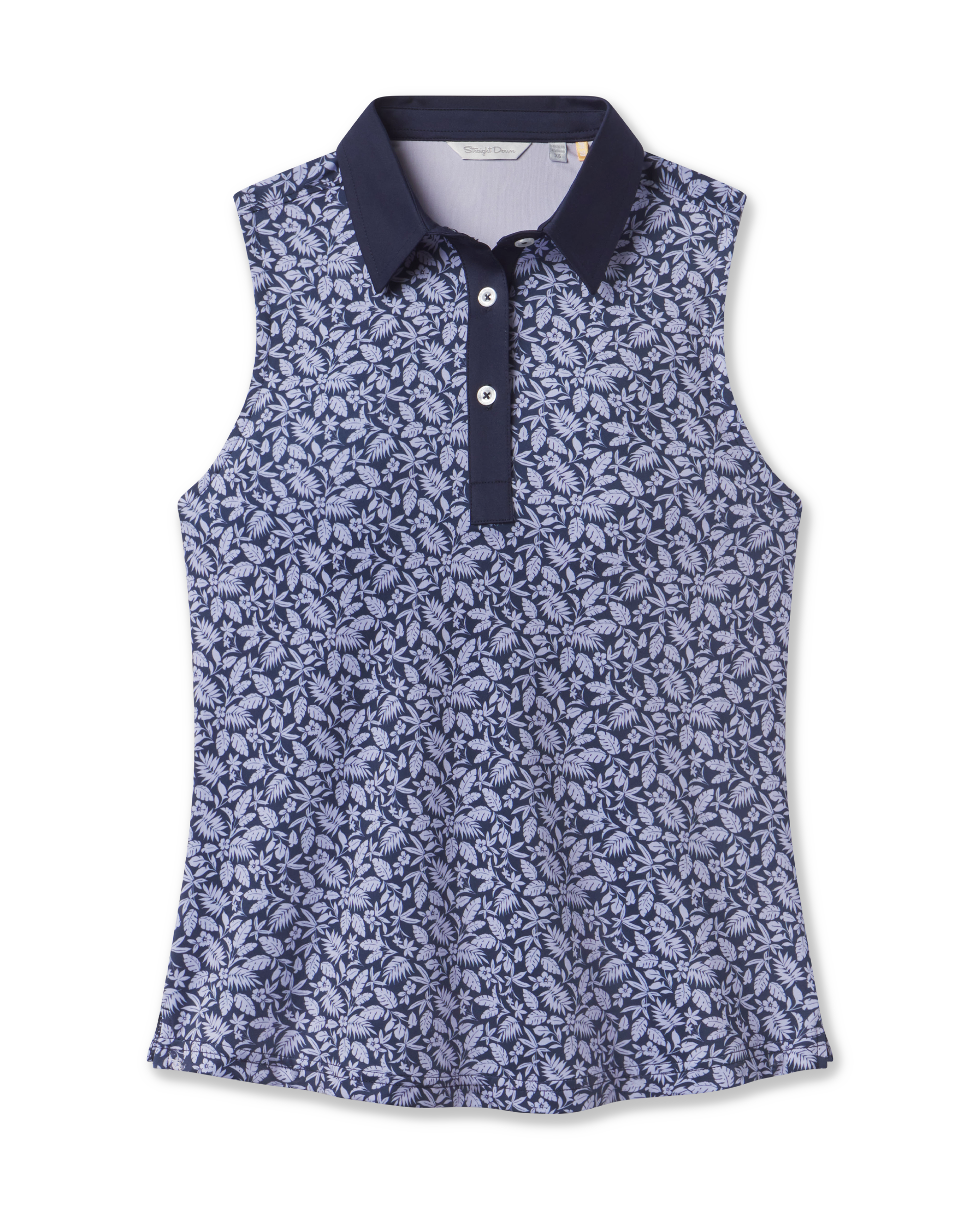 Women's Huli Sleeveless Polo in New Indigo featuring an allover tropical leaf and floral print in soft lavender tones on a deep indigo background, with a solid indigo collar