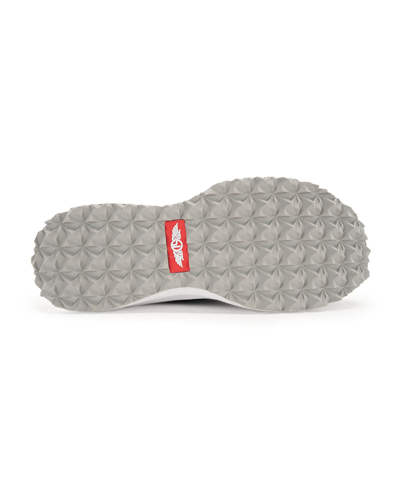 Swing Shoe in Black, bottom view featuring the grey geometric traction outsole with Straight Down logo red label at the center