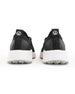 Swing Shoe in Black, back view of a pair featuring the black heel cap, Straight Down logo pull tab, white midsole, and grey traction outsole