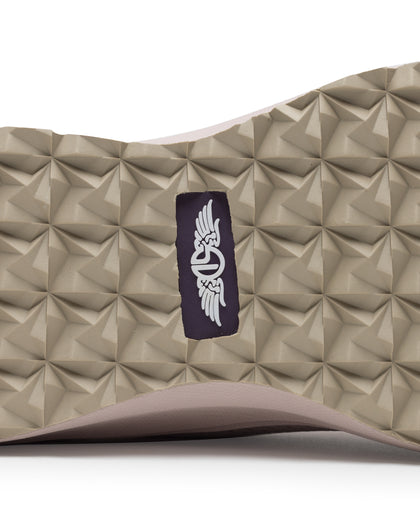Swing Shoe in Rosewine, close-up bottom view featuring the tan geometric traction outsole with Straight Down navy logo label at the center and blush midsole edge