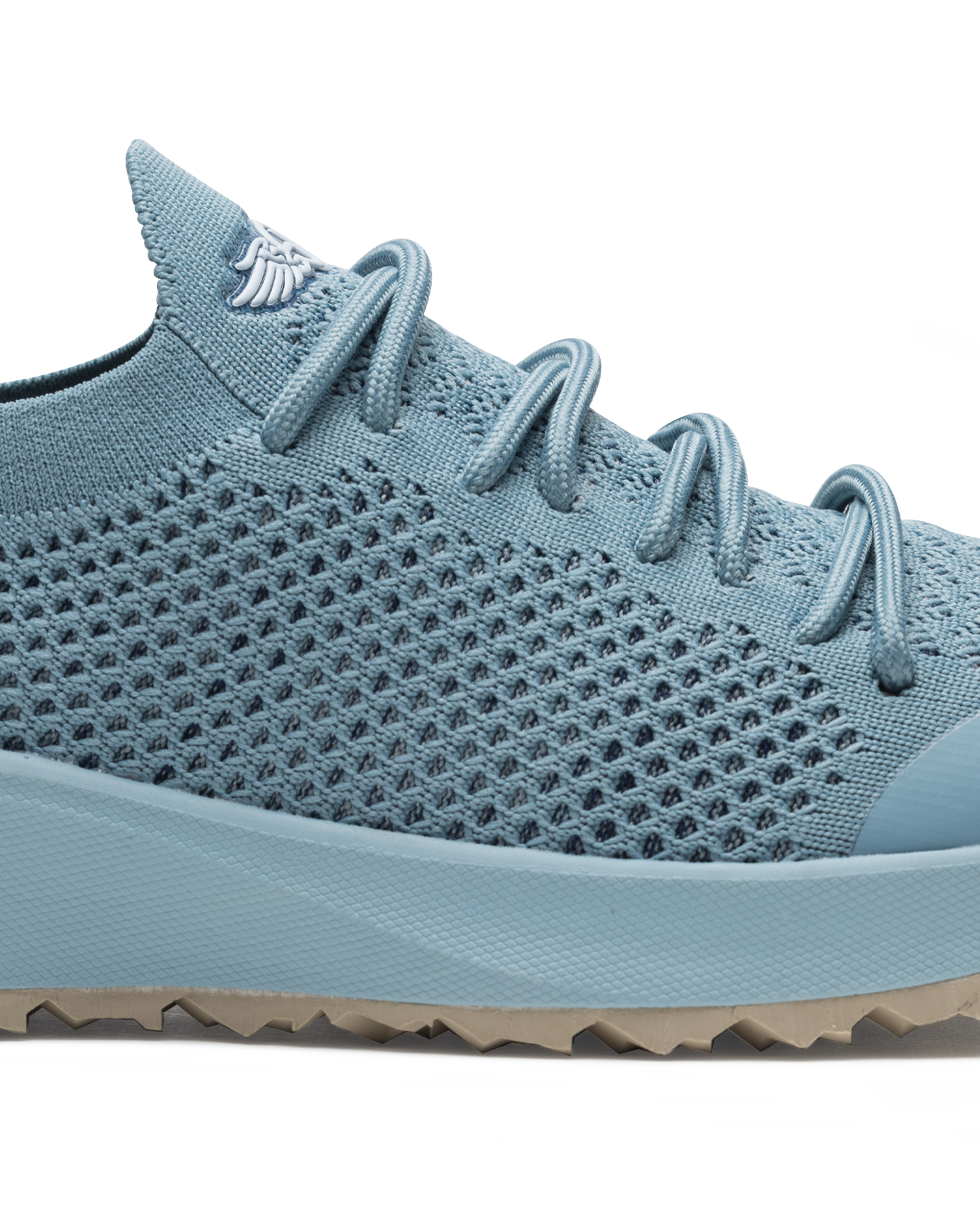 Swing Shoe in Mineral, close-up side view featuring the open-weave knit upper texture, tonal laces, and Straight Down logo on the tongue with light blue midsole and tan traction outsole