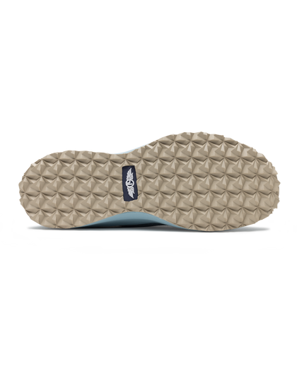 Swing Shoe in Mineral, bottom view featuring the tan geometric traction outsole with Straight Down logo navy label at the center